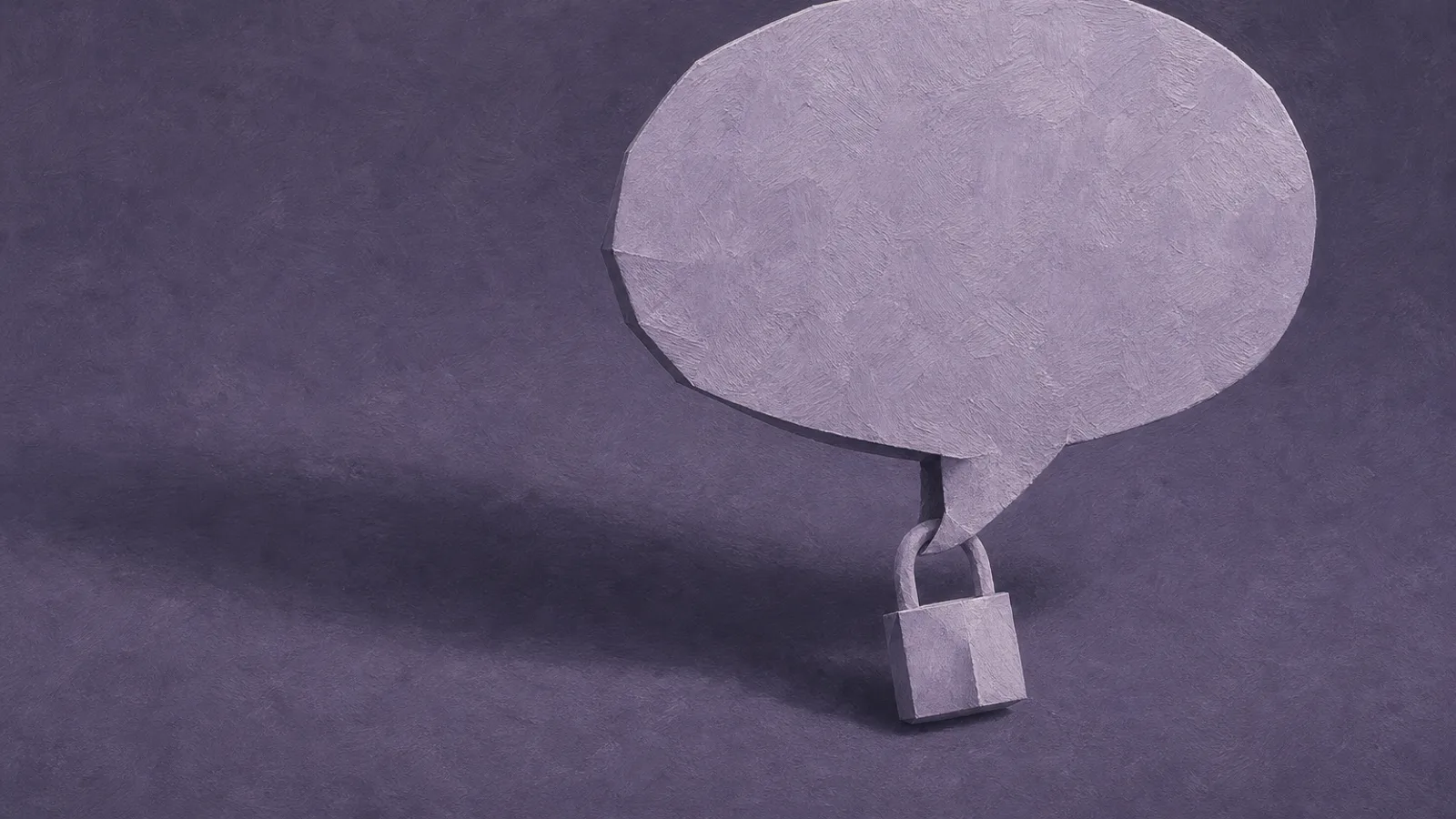 A paper speech bubble with a small folded padlock on its tail, on a dusty-violet surface