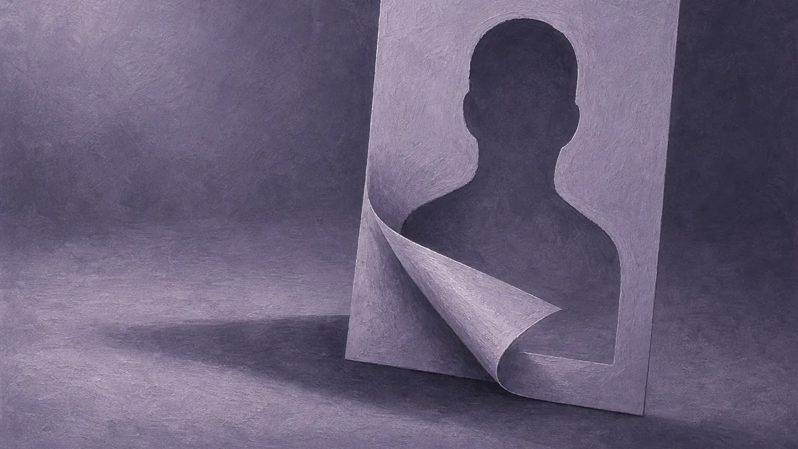 A paper portrait card with its printed face lifting away to reveal a hollow cut-out