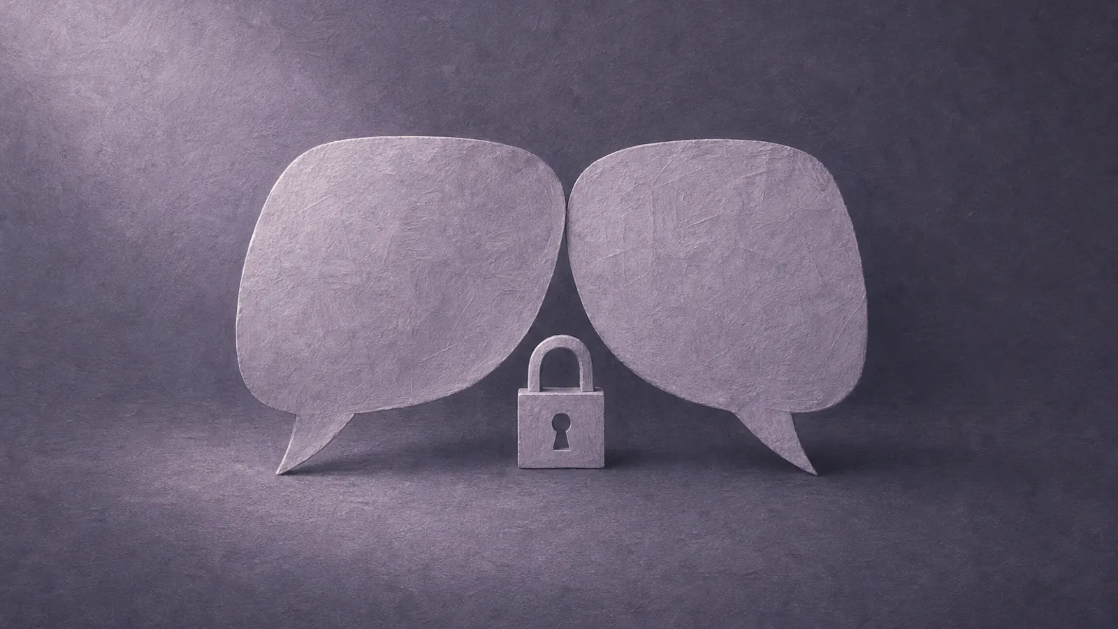 Two folded paper speech shapes leaning together over a small paper lock on a dusty-violet surface