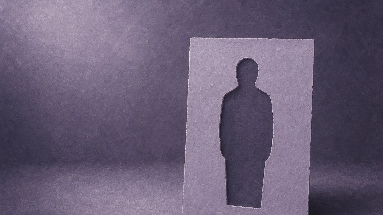 A paper portrait card on a dusty-violet surface with a blank nude silhouette cut from its center