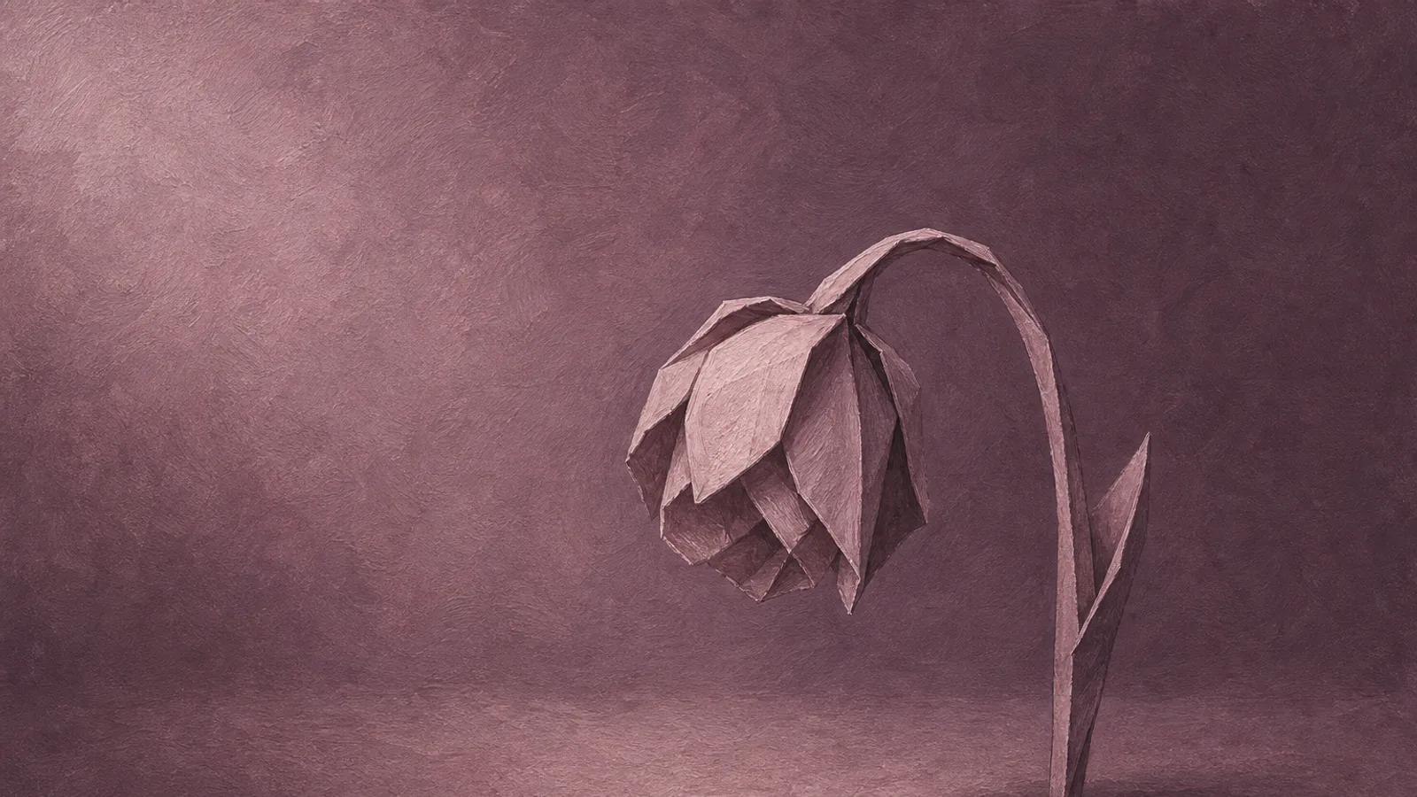 Eine hängende Papierblume mit nach innen gerollten Blütenblättern auf einer schlichten Fläche
