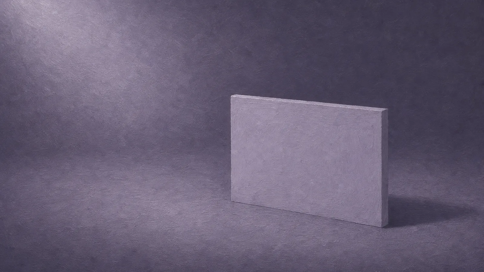 A small solid paper barrier set squarely across a dusty-violet surface