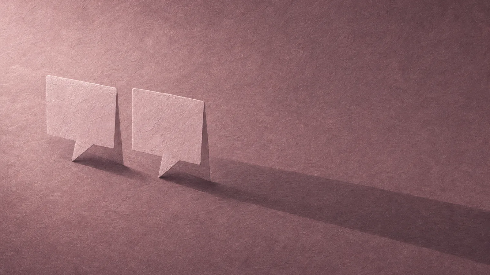 Two paper speech bubbles side by side, one with a short shadow, one endless